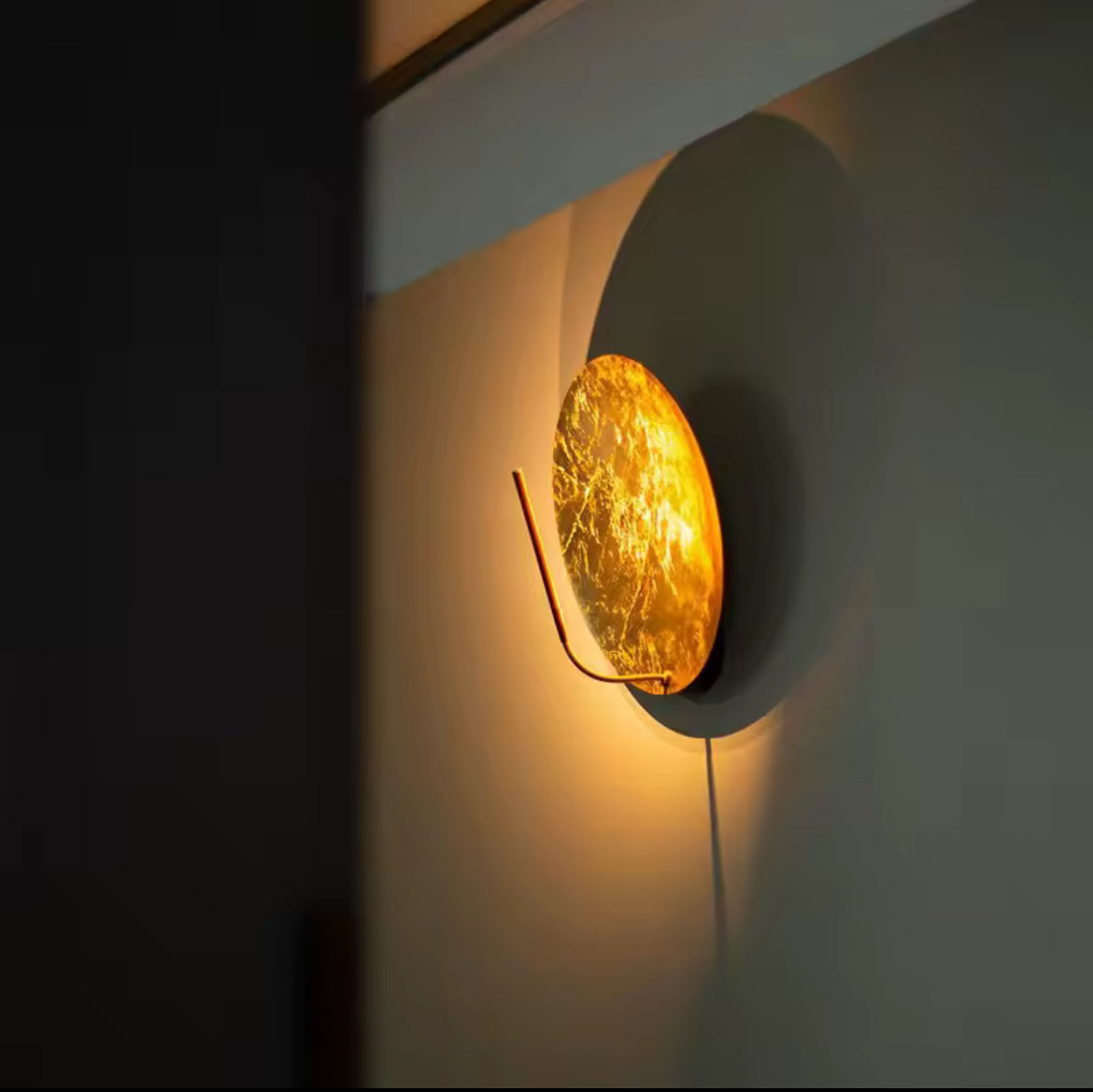 Helios Disc modern outdoor circular LED wall light for exterior spaces